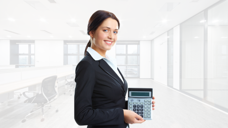 a forensic accountant that is holding a calculator