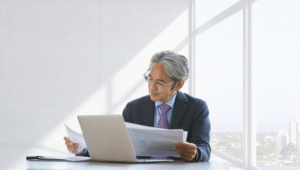Business owner reviewing compliance requirements